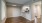 a kitchen with white cabinets