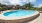 a swimming pool in a backyard