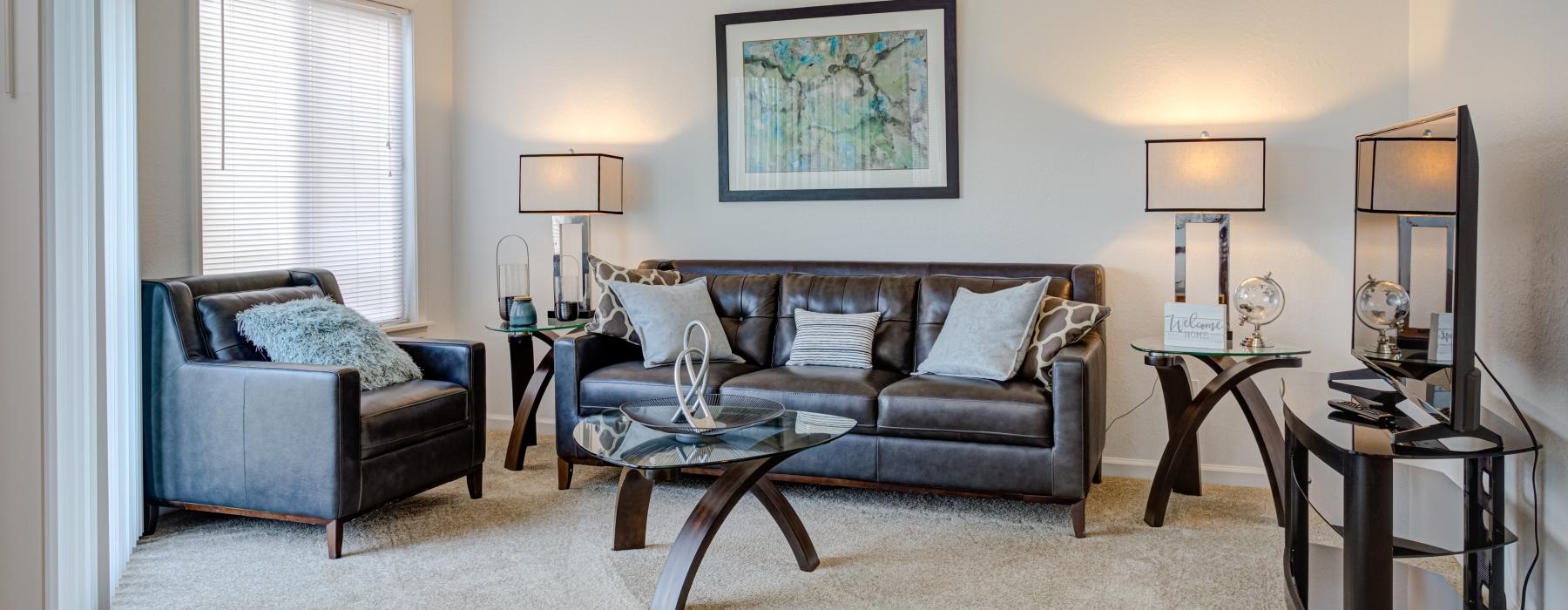 a living room with a couch and a coffee table